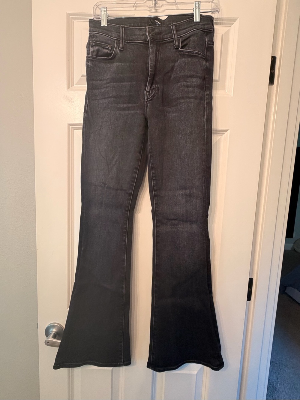MOTHER Black Flare Jeans with Subtle Fade